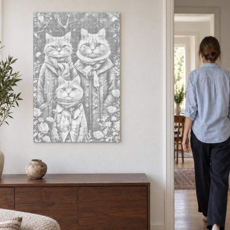 Punktmalerei-Leinwand “Katzenfamilie”, an einer hellen Wand, während eine Person durch die Tür geht.