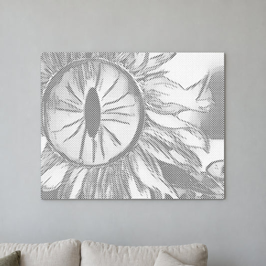 Punktmalerei-Leinwand “Sonnenblumenauge”, an einer hellen Wand in einem Raum mit sanftem Tageslicht.